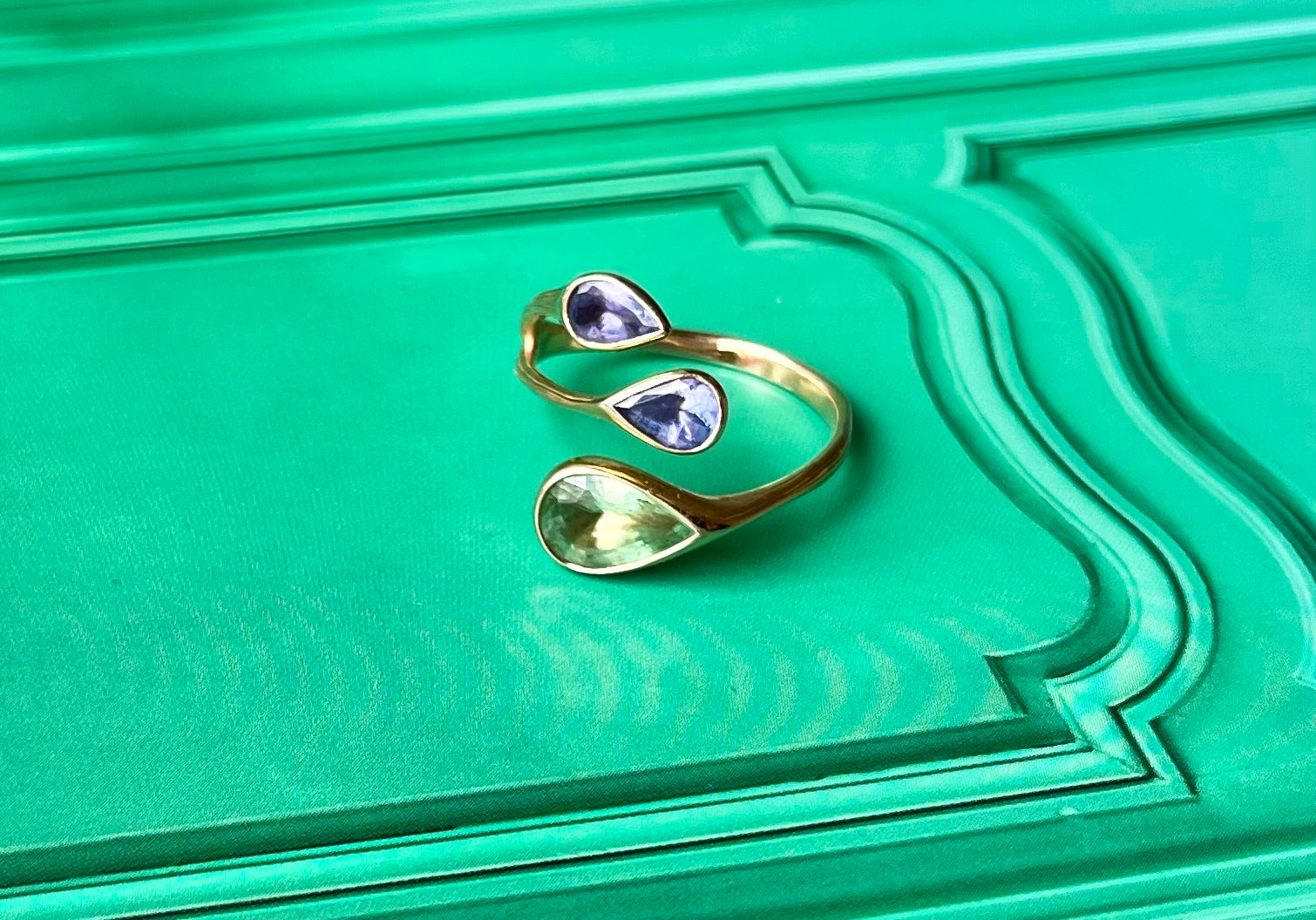 A Tanzanite & Green Garnet vine ring