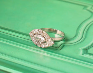 Diamond eye ring with marquise