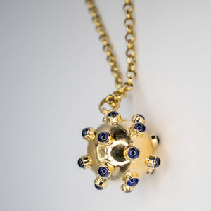 Bomb pendant with sapphire Cabochons